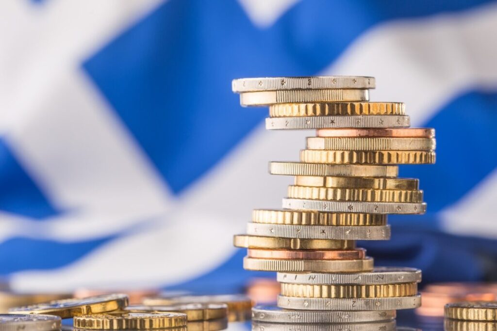 Τα ελληνικά ομόλογα αμύνονται στις διεθνείς πιέσεις και στοχεύουν σε νέες αναβαθμίσεις